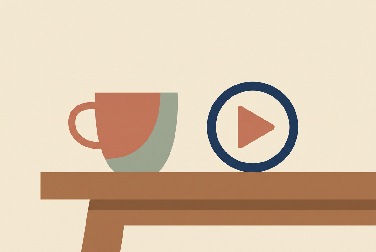 Flat vector illustration of a handmade ceramic mug on a workbench beside a play button